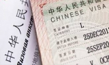 中国暂停外国公民持有效签证,居留许可入境